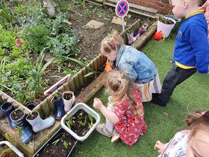 West End Play Group Planting Flowers